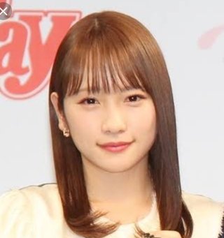 口角が上がった女の子可愛い