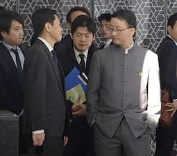 ポケットに手の劉局長「日系企業は中国で安心して事業活動をしてほしい」